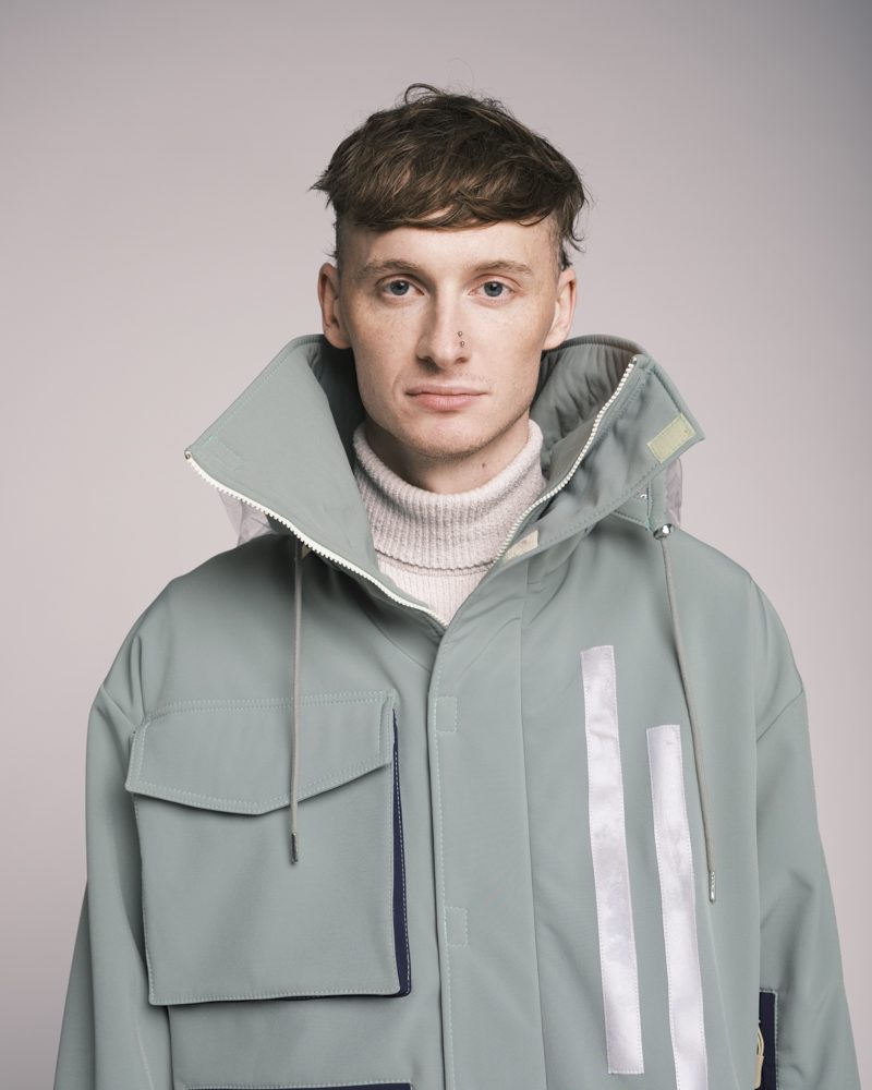 Face avant de la veste sauge avec poche technique
